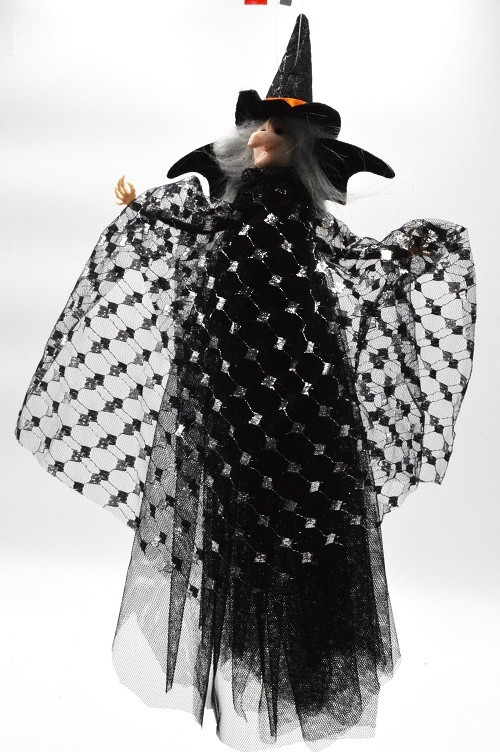 22100 - Wicked Witch Halloween hanging decoration with a black mesh silver detailed shawl.  Height 40cms , Width  25cms  (Approx) 