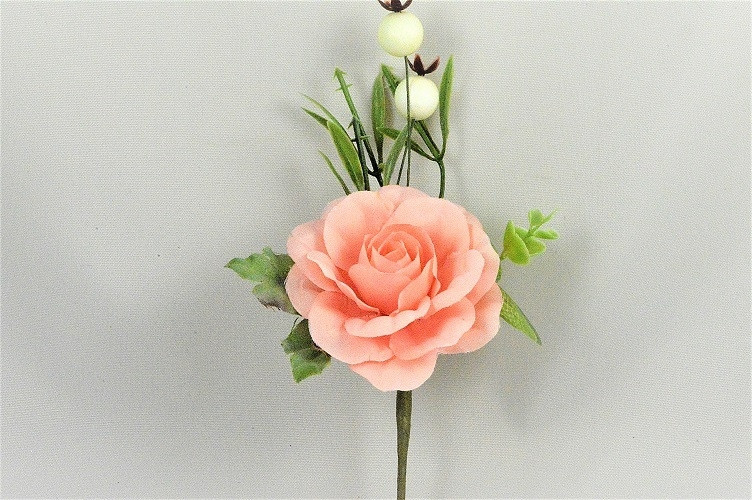 33005 - Soft Rose Pink floral arrangement with beautiful embellishments.  Height  17cms ,  Width  9cms  (approx)