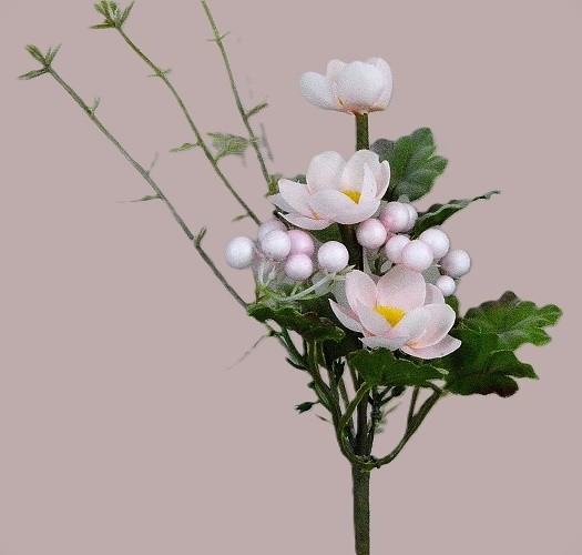 33007 - Spring floral arrangement.  Delicate pink petals surround a bright Yellow centre.  Height  21cms ,  Width  9cms  (approx )
