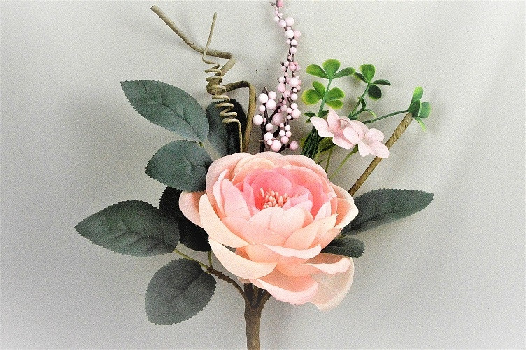 33008 - Soft Rose floral arrangement embraced with lush leaves and embellishments.  Height  28cms ,  Width 21cms  (approx) 