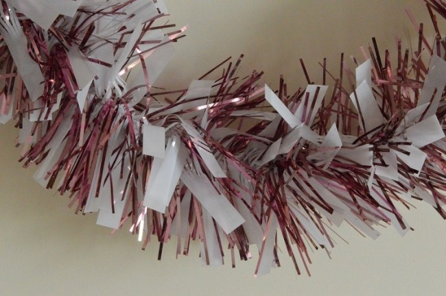 88134 - Pink Coloured Tinsel with Hanging White Deco x 2 Metre Lengths!