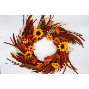 22086 - Large Summer/Autumn hanging wreath. Beautiful floral arrangement of glowing sunflowers entwined with delicate white flowers, berries and soft textures of grass. Approx Size:  70cm Outer Dia