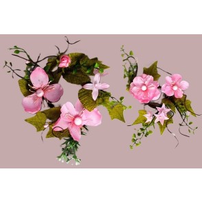 33018 - Delicate Pink Flowers wrapped with vibrant green leaves make these a lovely floral decorative arrangement.  Two Sizes Available.  