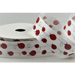 55136 - 22mm White grosgrain ribbon printed with a Swirling Lady Birds design x 10mts. 