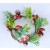 22079 -  Wintery wreath with a display of snowy pine needles, cones and large frosted berries. Floral decoration.  Size   Approx 23cm diameter
