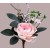 33008 - Soft Rose floral arrangement embraced with lush leaves and embellishments.  Height  28cms ,  Width 21cms  (approx) 