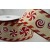 46067 - 63mm Wired edge Red Swirls Christmas design onto a Cream ribbon with a detailed edge x 10m 